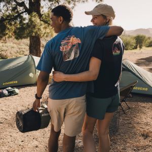 man and woman enjoying the outdoors